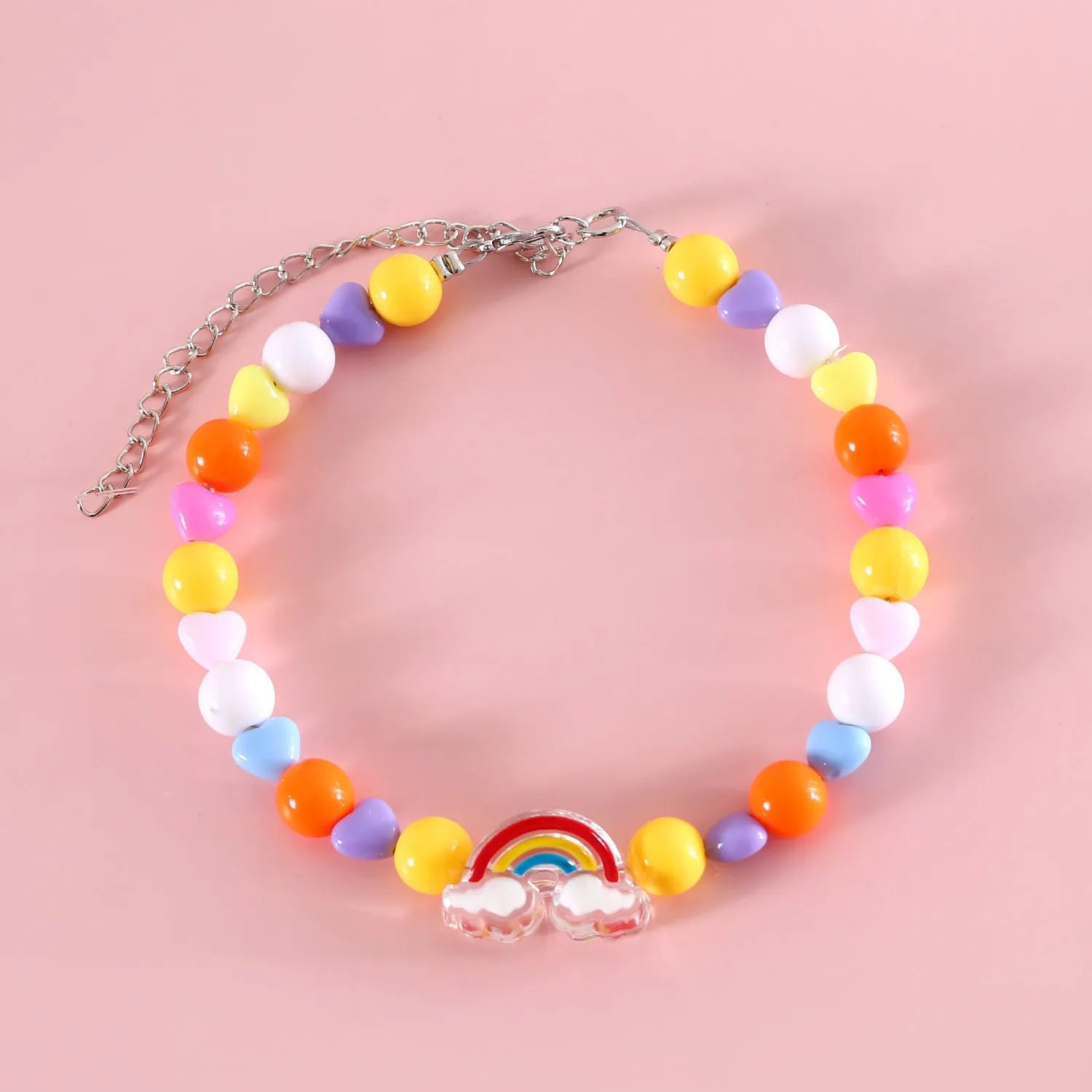 Colourful plastic bead necklace for cats in peach, rainbow, or small flower patterns with adjustable XS or S sizing