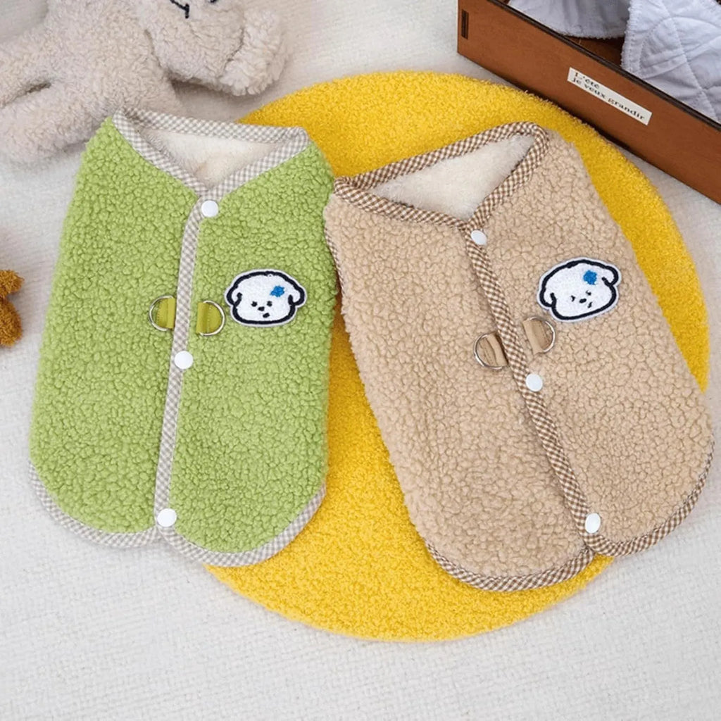 Green thickened coral fleece dog vest with leash ring on a small dog
