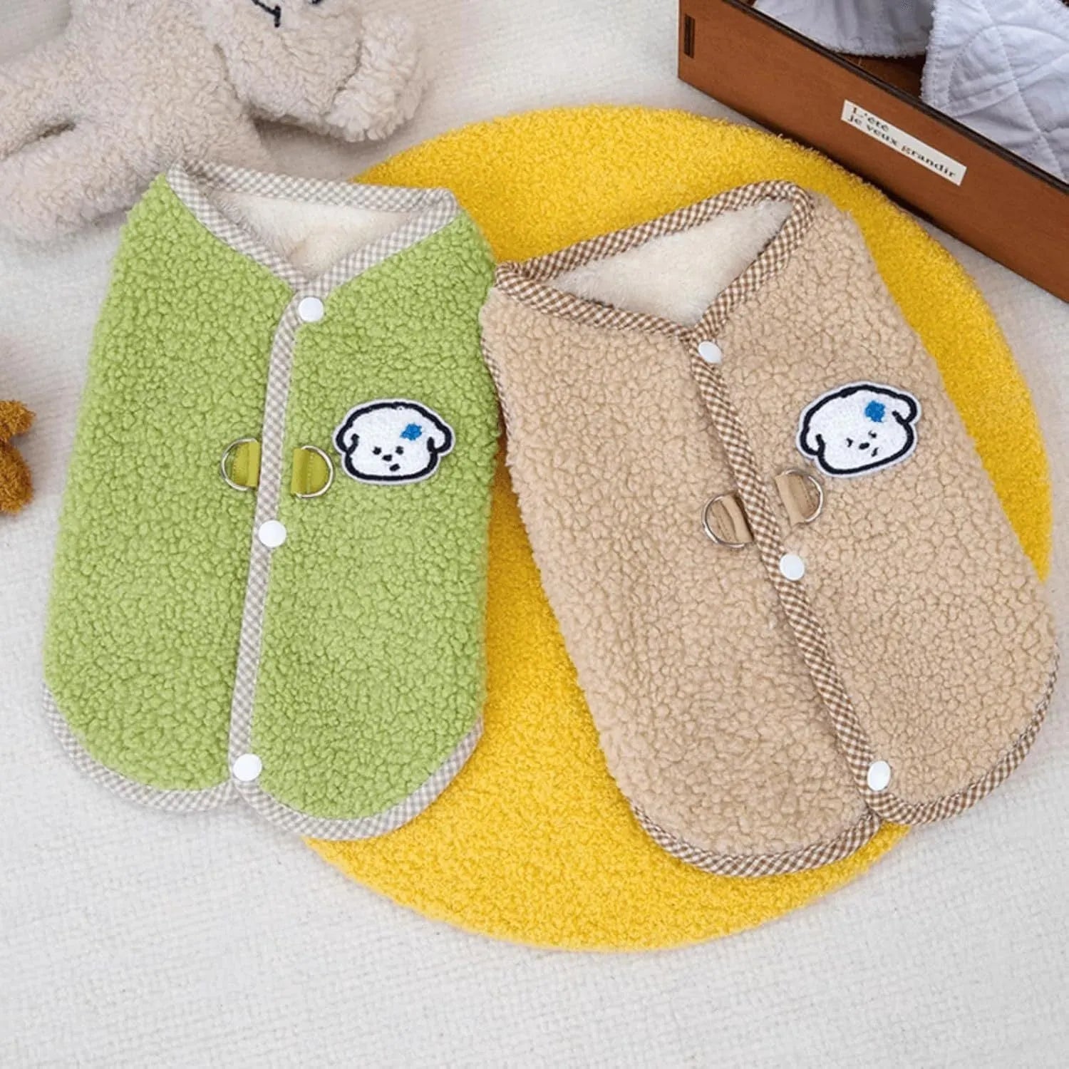 Green thickened coral fleece dog vest with leash ring on a small dog