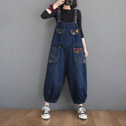 Plus size floral print suspender jeans in black and blue, made from durable denim cotton.
