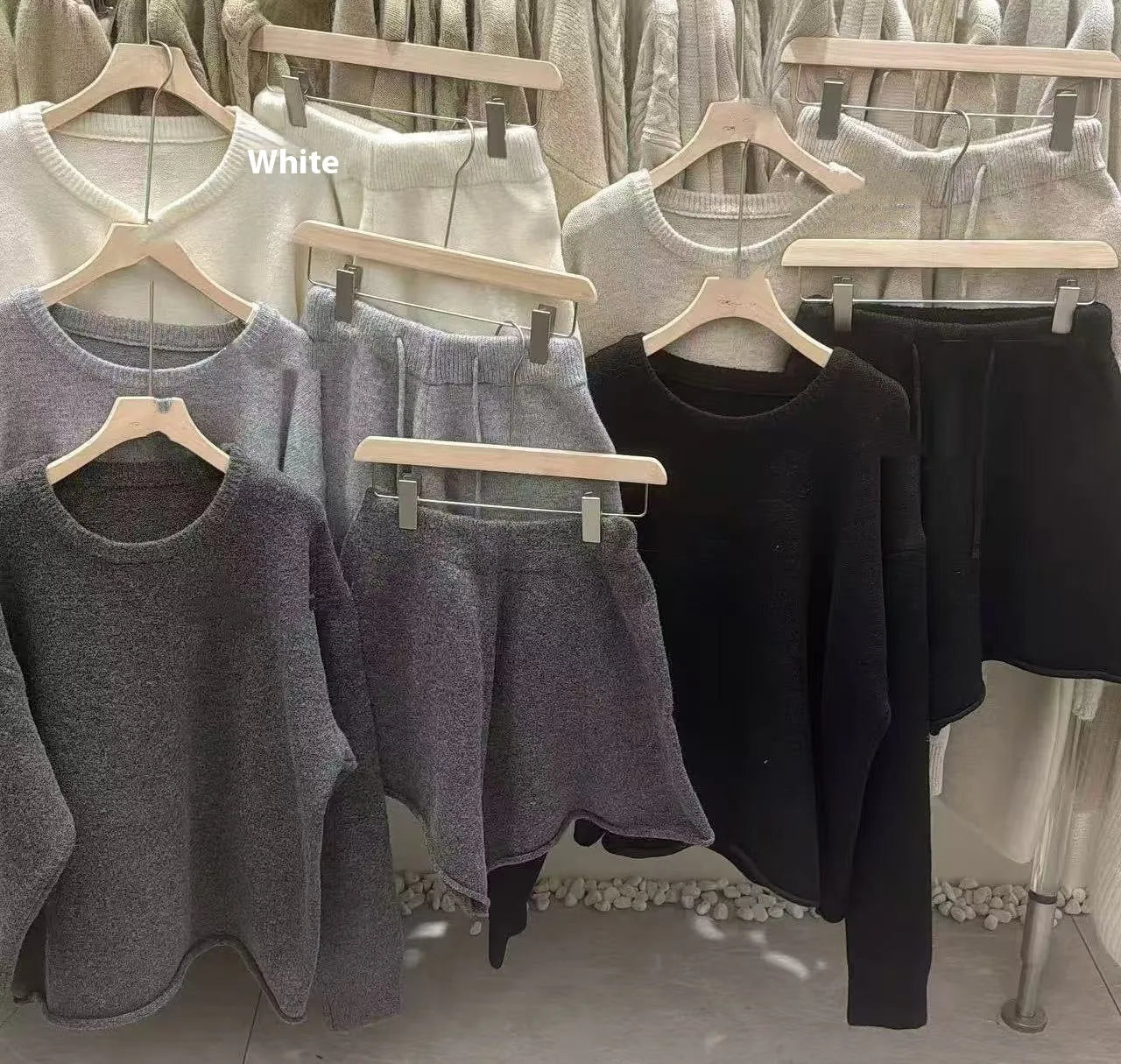 Women's loose-fit acrylic knit sweater and wide-leg shorts co-ord set in oatmeal colour.