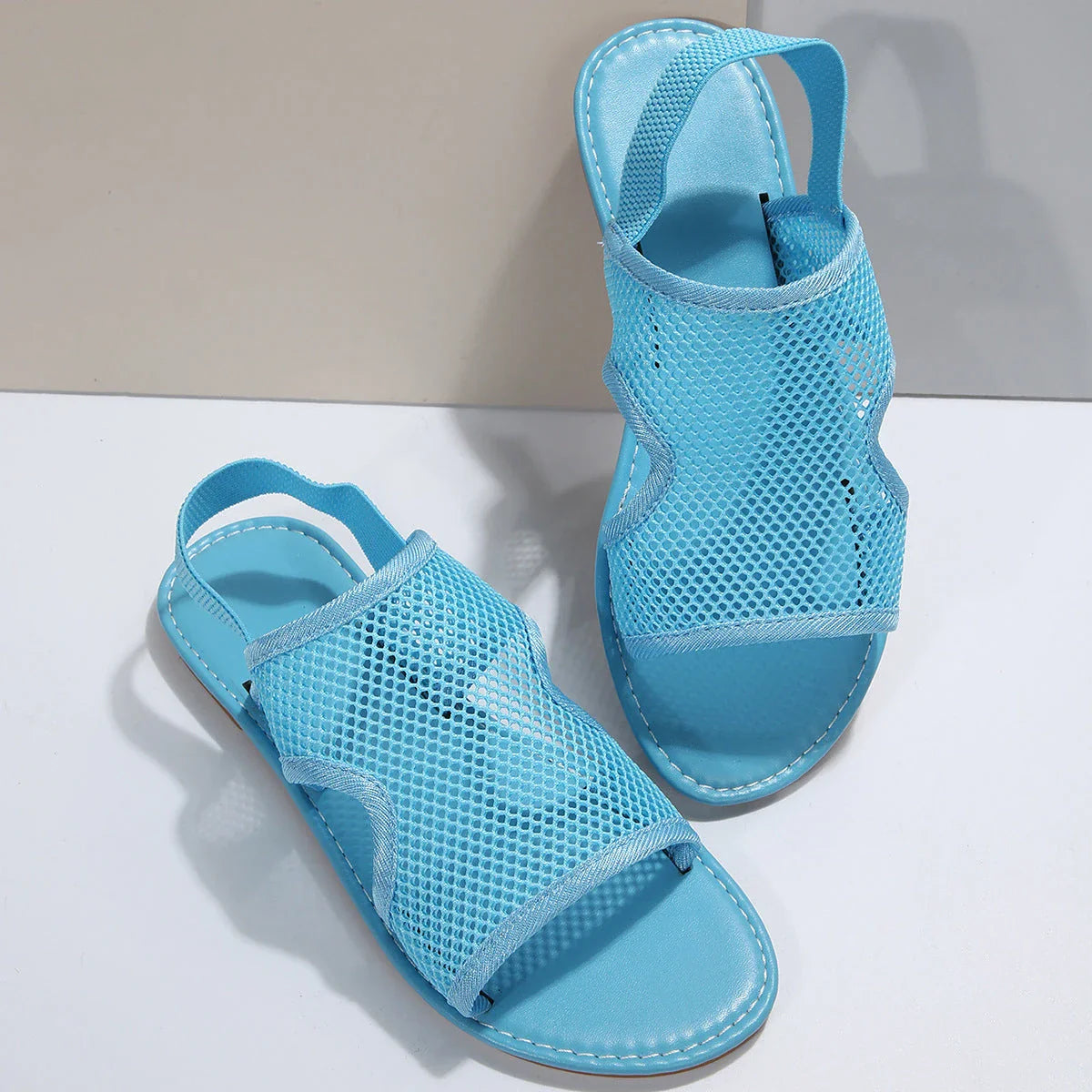 Breathable mesh sandals in various colors, perfect for summer beach and casual wear