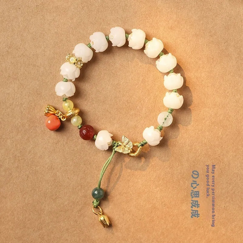White jade bodhi bracelet with hand-woven lotus and pumpkin beads on open rope