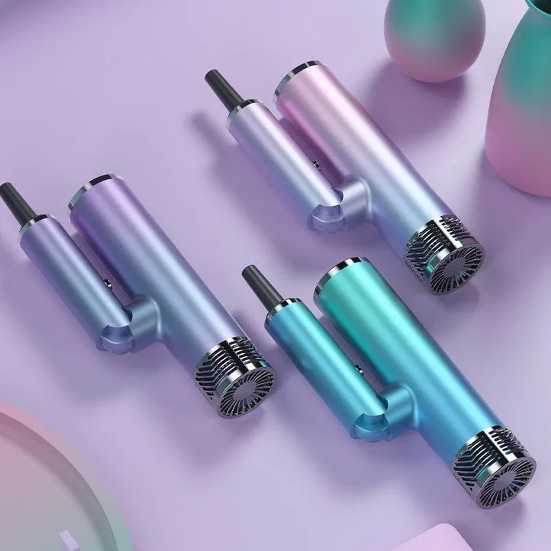 Green and purple foldable hair dryer with collapsed handle for compact storage