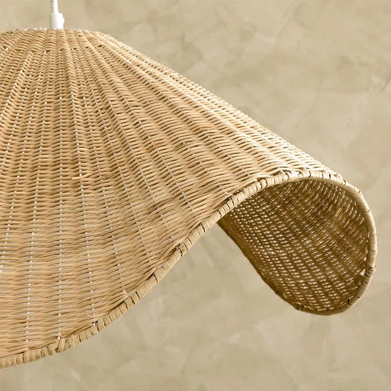 Handmade bamboo and straw rattan chandelier with warm LED light in natural woven design