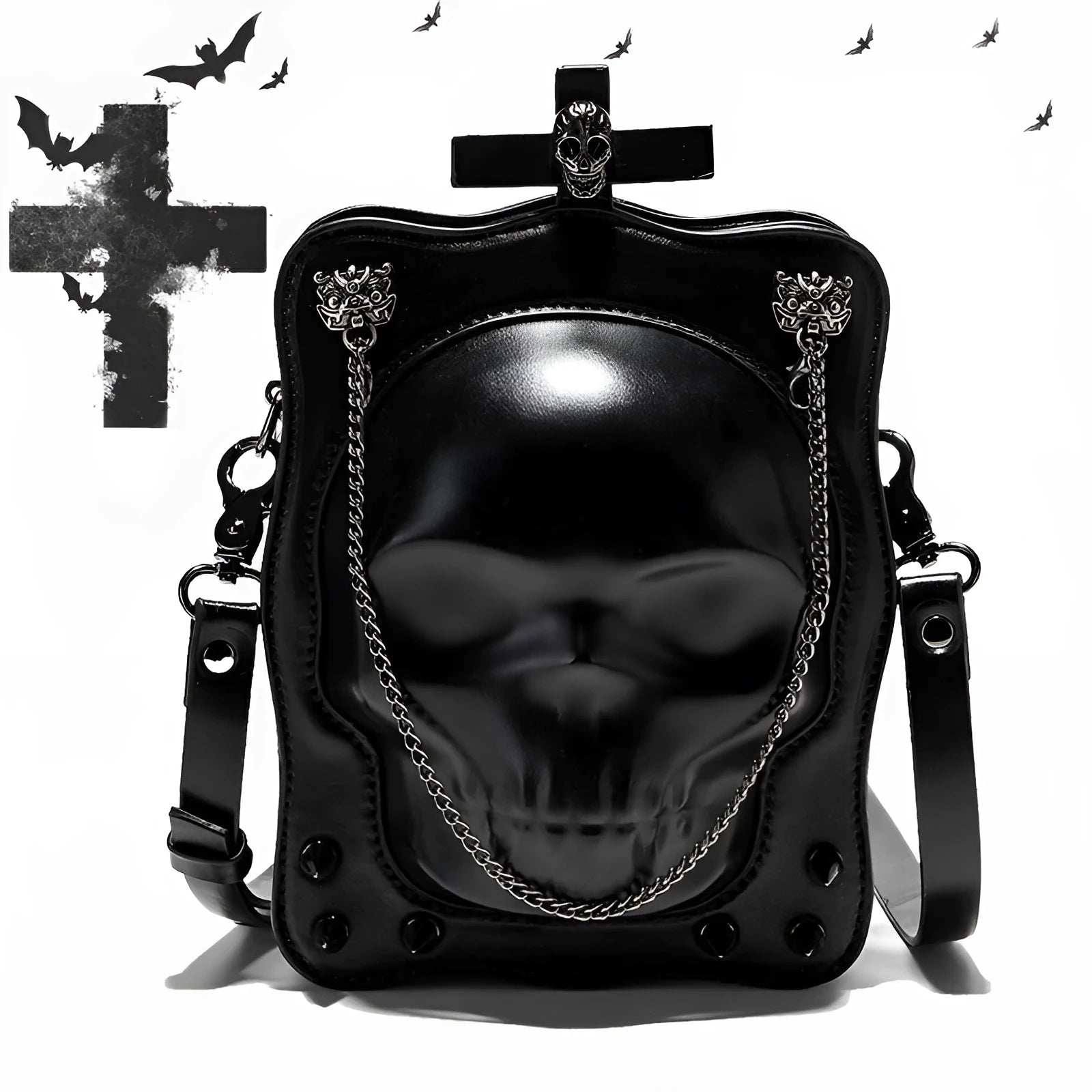Black mini square crossbody bag with detailed skull embossing, rivets, and a shoulder strap.