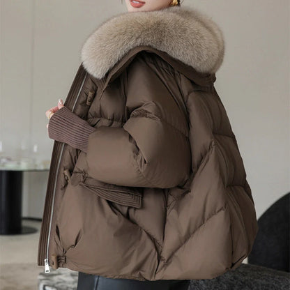 Women's winter down jacket with elegant fur collar available in brown, black, and white.