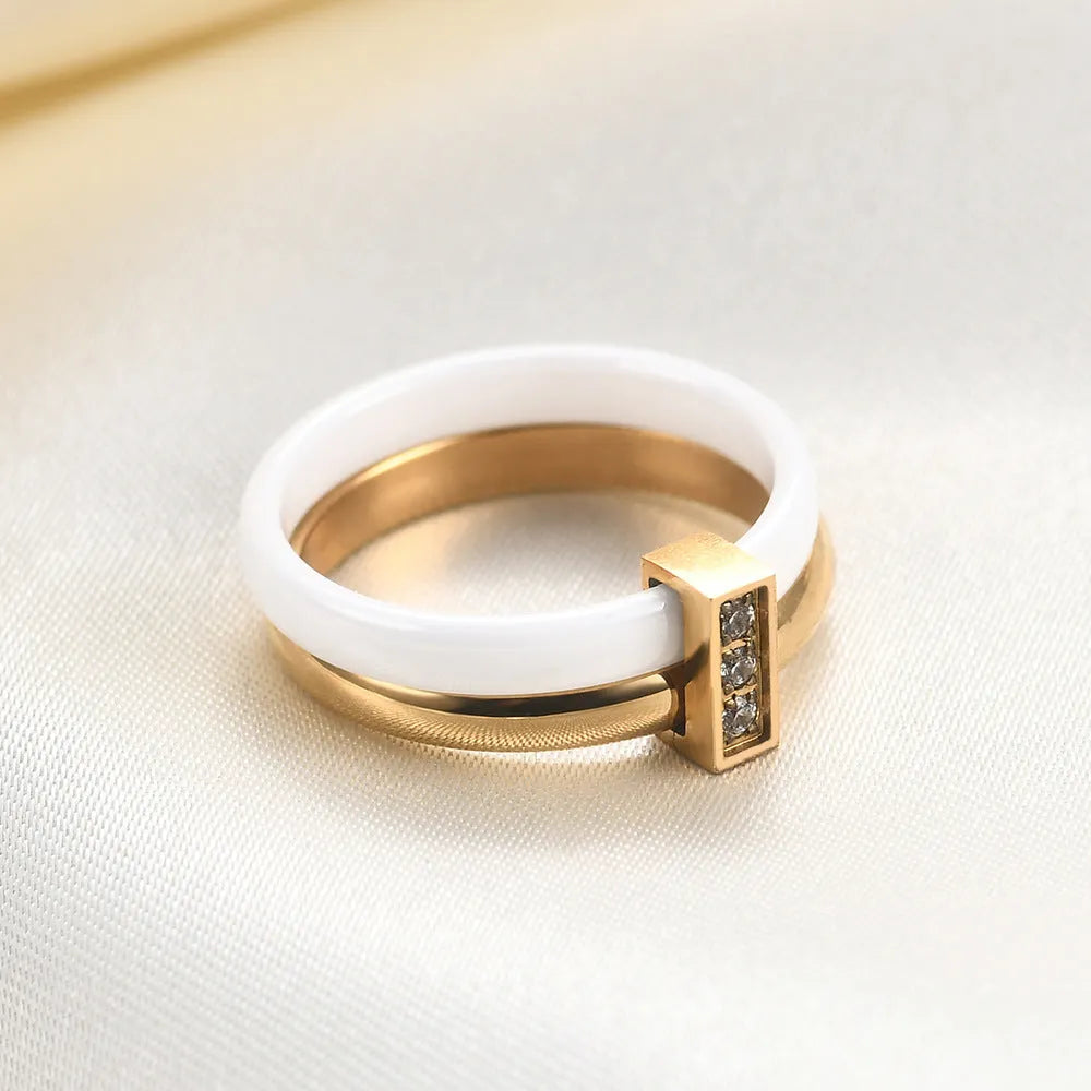 Glossy black ceramic women's ring with a zirconium inlay on a 6mm wide band.