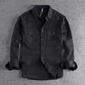 Man's loose fitting long sleeve cardigan shirt in light grey, black, khaki, or green.