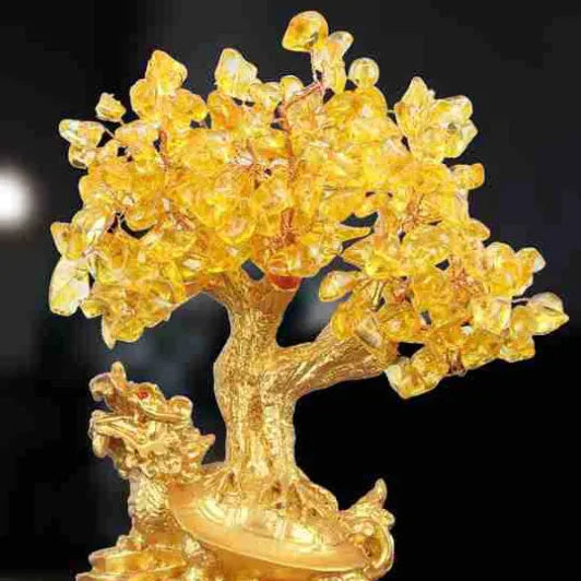 Citrine-coloured resin turtle money tree ornament with Chinese design style.