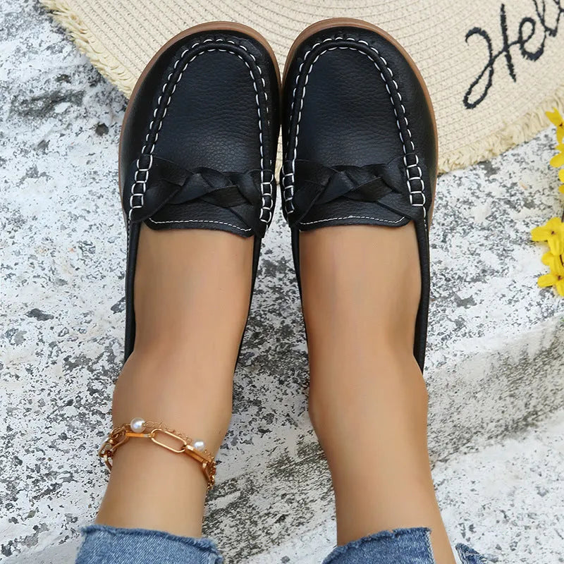 Women's flat shoes with woven PU upper, round toe, low heel, available in solid colours for spring autumn.