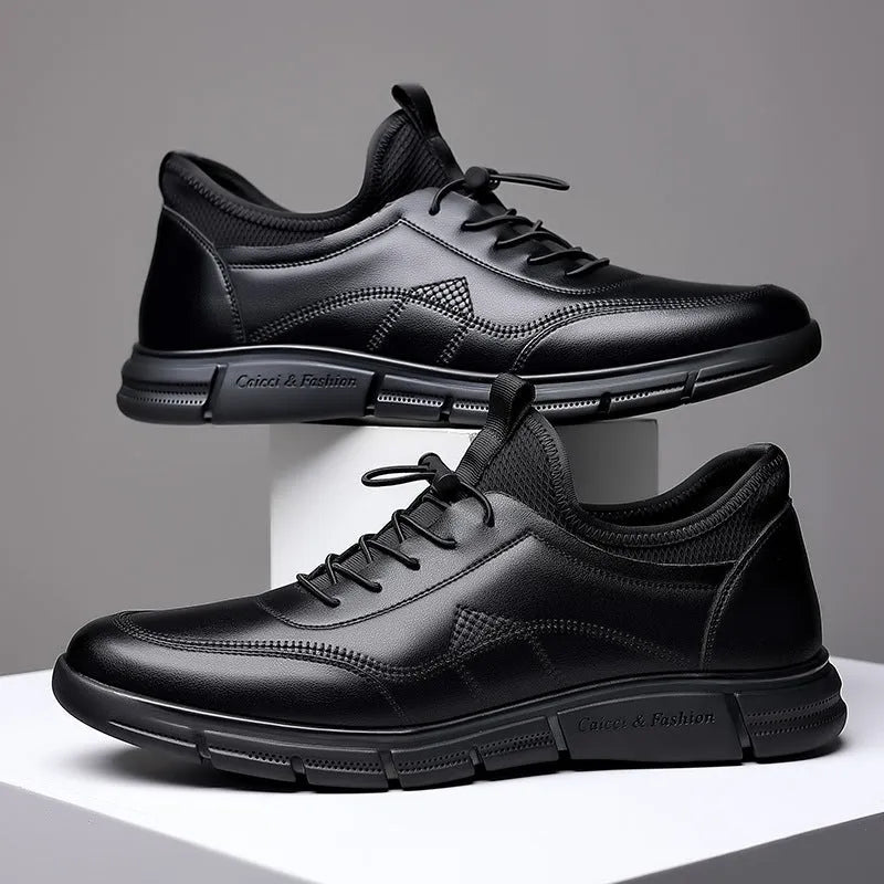 Black men's casual leather shoes with a round toe, square low heel, and a stitched leather upper on a rubber sole.
