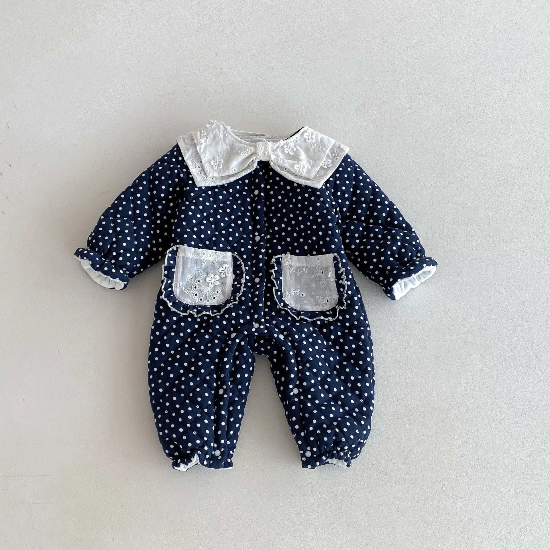 Baby girls winter cotton-padded fleece-lined onesie in dark blue on white background