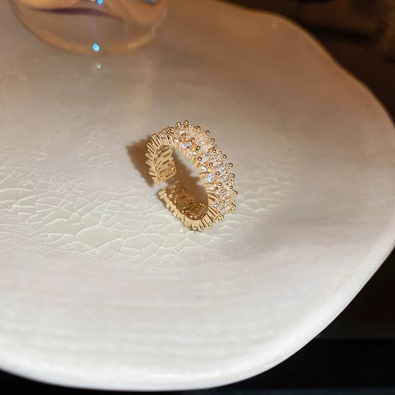 Pearl Hollowed-out Square Open-end Zircon Ring in gold, showcasing unique geometric design