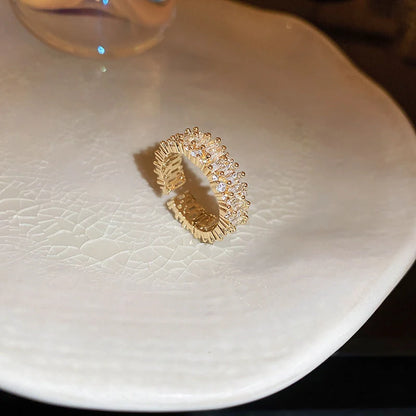 Pearl Hollowed-out Square Open-end Zircon Ring in gold, showcasing unique geometric design