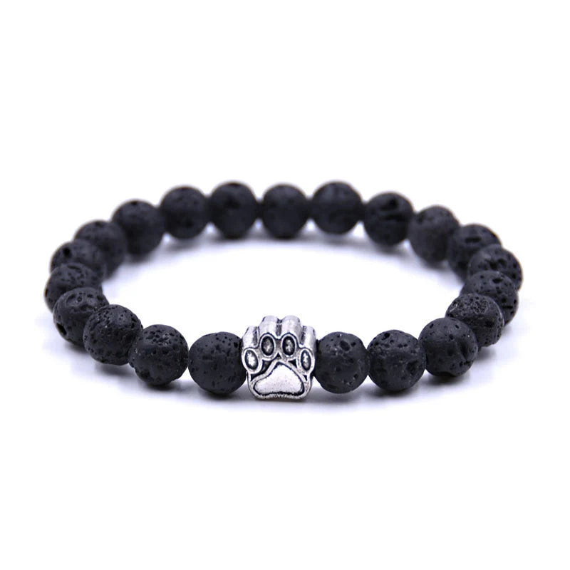 Natural stone dog paw bracelet featuring tiger eye and volcanic stone in a unisex design