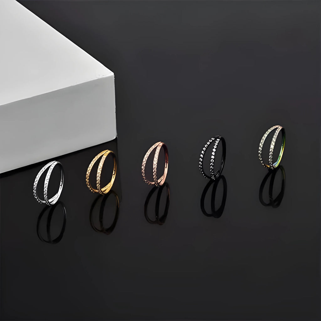 Titanium alloy nose ring with G23 purity and diamond-treated zircon surface in gold or steel colour