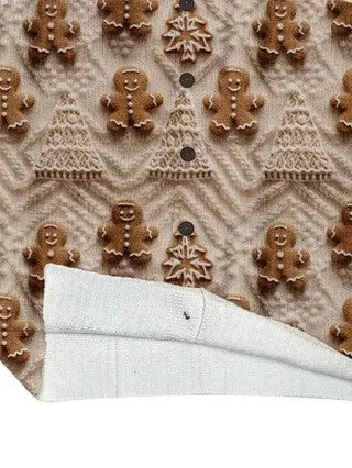 Loose-fit digital printed top with lapel collar in assorted sizes on a hanger.