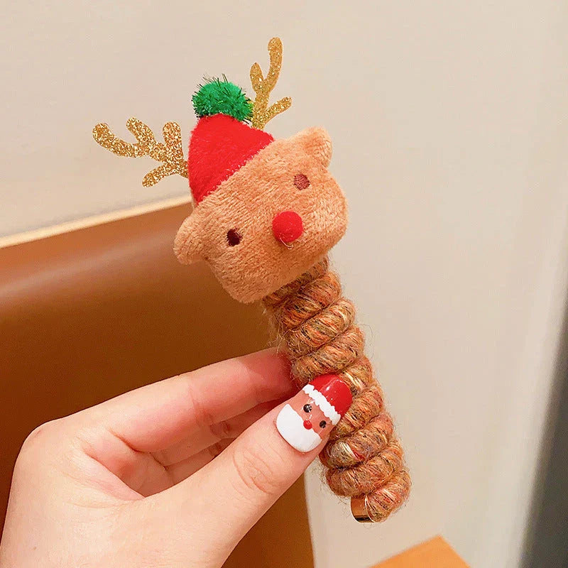 Festive Christmas hair ties for girls in various holiday-themed designs, including red bells, green trees, and khaki deer.