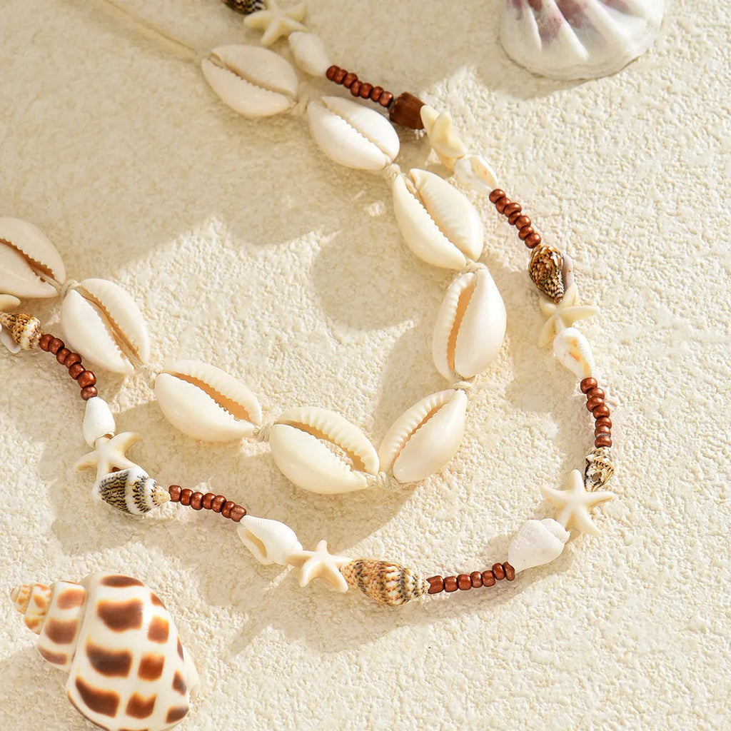 Geometric seashell pendant necklace on regular chain, colour X1900