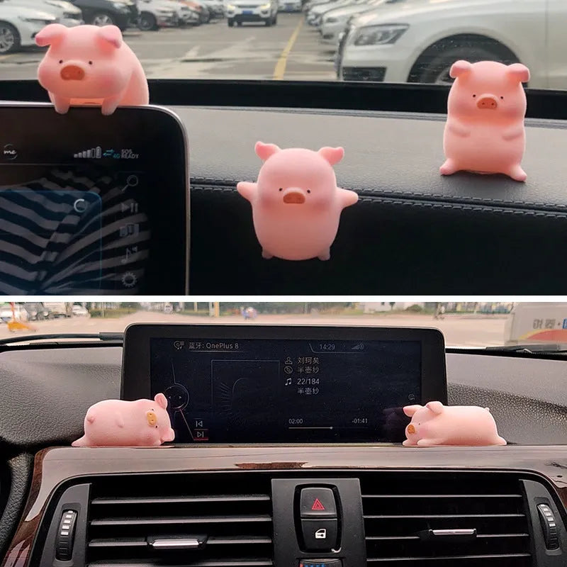 Resin cartoon pig car dashboard decoration ornament in one of eight available styles.