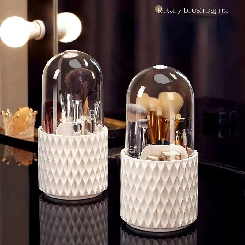 White rotating acrylic makeup brush holder with transparent dust cover showing brush compartments