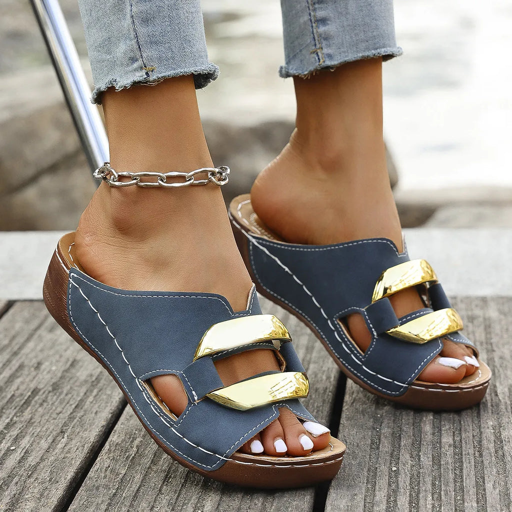 Solid colour Roman style platform flip-flops on a white background showing the artificial PU upper and rubber sole.