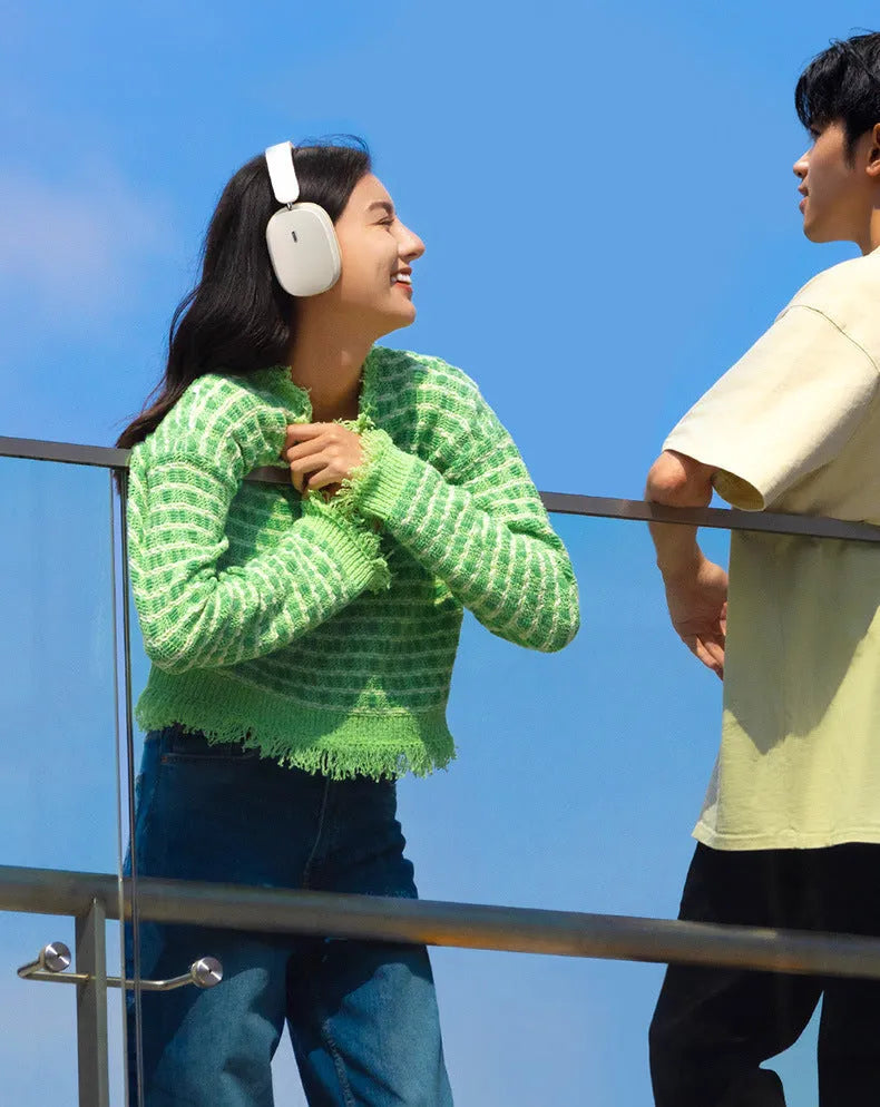 Active noise reduction Bluetooth 5.2 headset in beige with head-mounted design and microphone