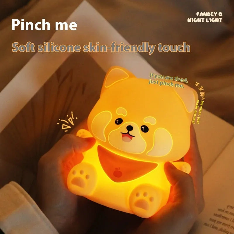 New Homehold Lesser Panda bedside lamp with silicone shade and USB charging cable on a table