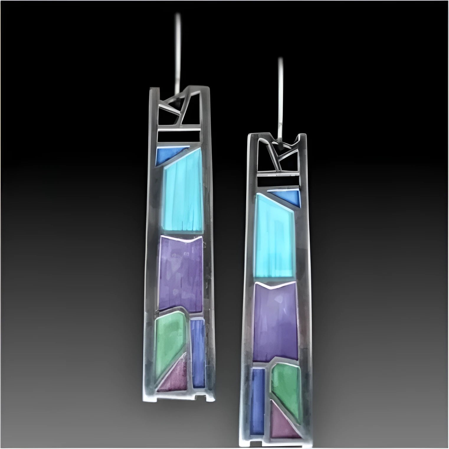 Silver water drop shaped geometric alloy women's earrings with irregular contours and post backings