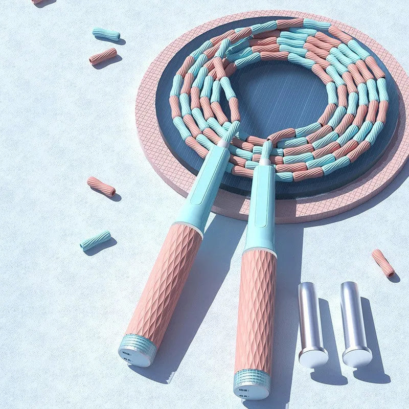 Children's bamboo bead skipping rope in blue with plastic foam handles