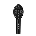 KD3802 Black coloured handheld scalp massager with vibration function and USB charging cable.