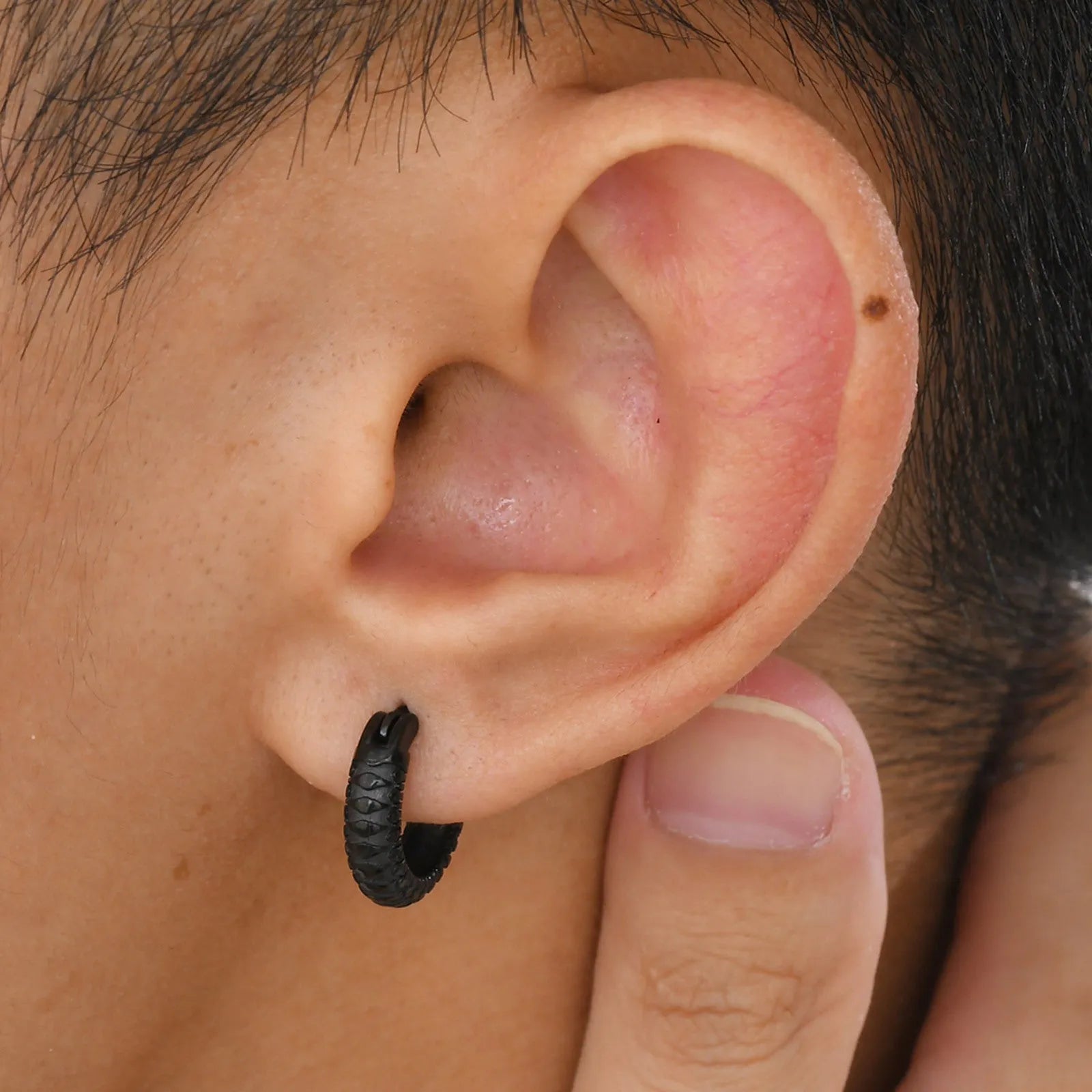 Stainless steel snake pattern earrings in black and gold colour options