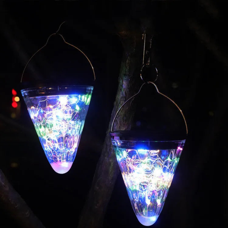 Solar conical starry sky garden light with IP65 waterproof rating, 130 x 150 mm, warm yellow LED output