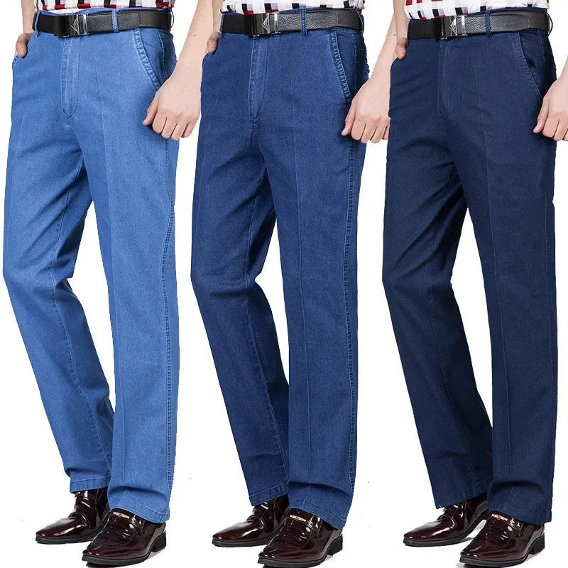 Men's high-waist loose-fit blue denim jeans on a hanger, showing the zip fly and relaxed leg cut.