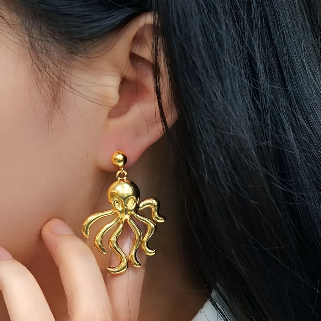 Gold octopus stud earrings made of stainless steel in minimalist retro style