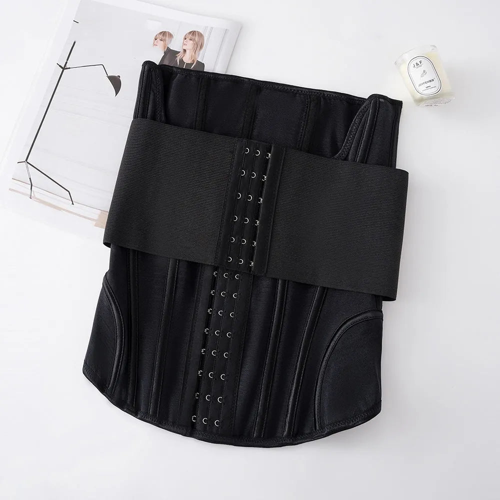 Black nylon waist training slimming belt laid flat, showing adjustable strap.