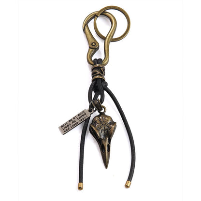 Retro leather rope keychain with lobster buckle and skull pendant in bronze and silver