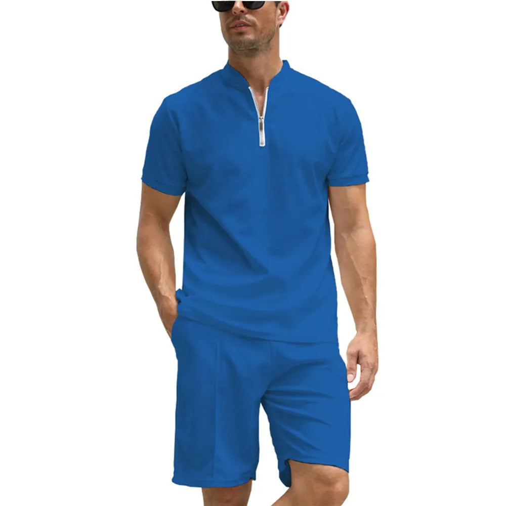Men's solid colour polo shirt and trousers two-piece casual suit set on a hanger.