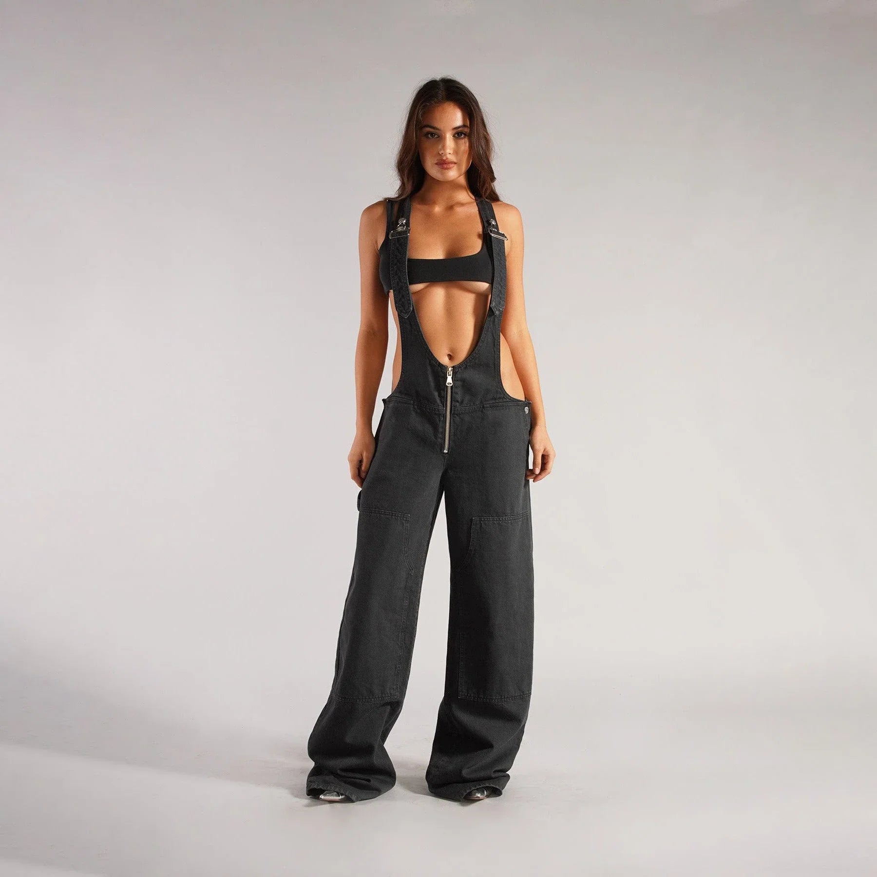 Trendy denim overalls with pockets, featuring a unique Y2K-inspired design, micro-elastic fit, and convenient layout for a stylish and comfortable streetwear look.