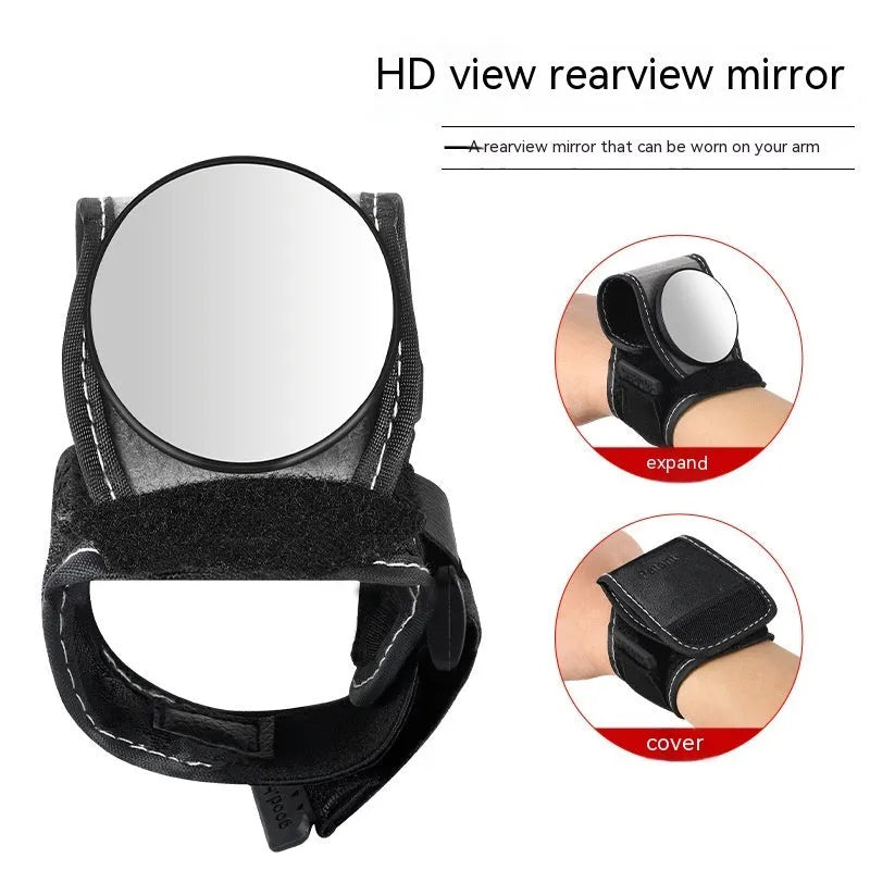 Black nylon bicycle rear-view mirror showing wrist mounting and adjustable viewing mechanism