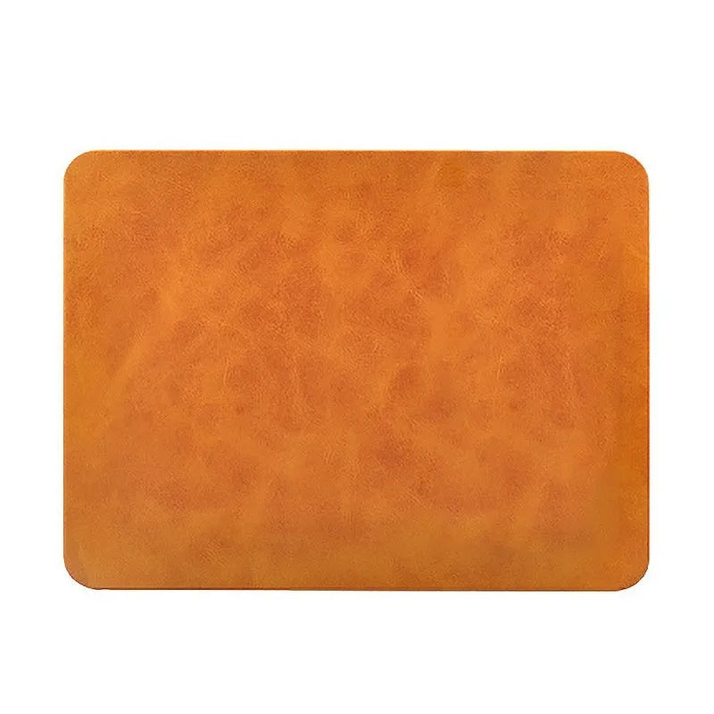 Brown leather-texture wireless charging mouse pad with micro USB cable for Qi-enabled devices.