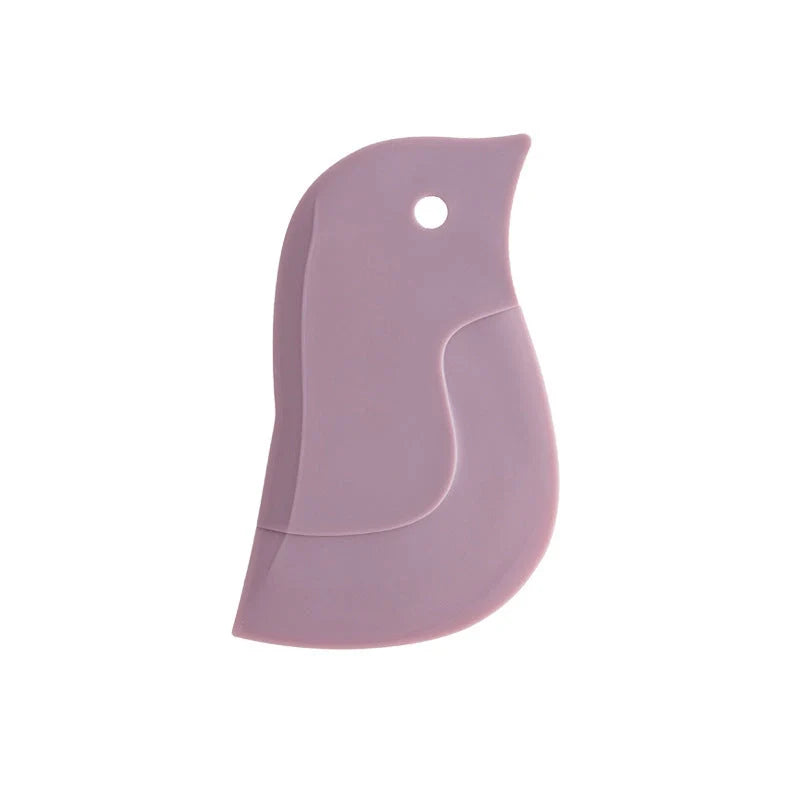Penguin-shaped kitchen scraper for efficient plate and pot cleaning