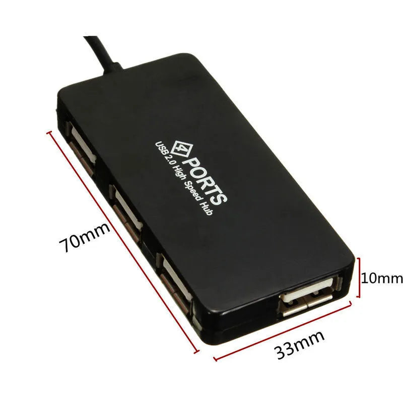 Black USB 2.0 4-port hub with cable and on/off switch on a desk