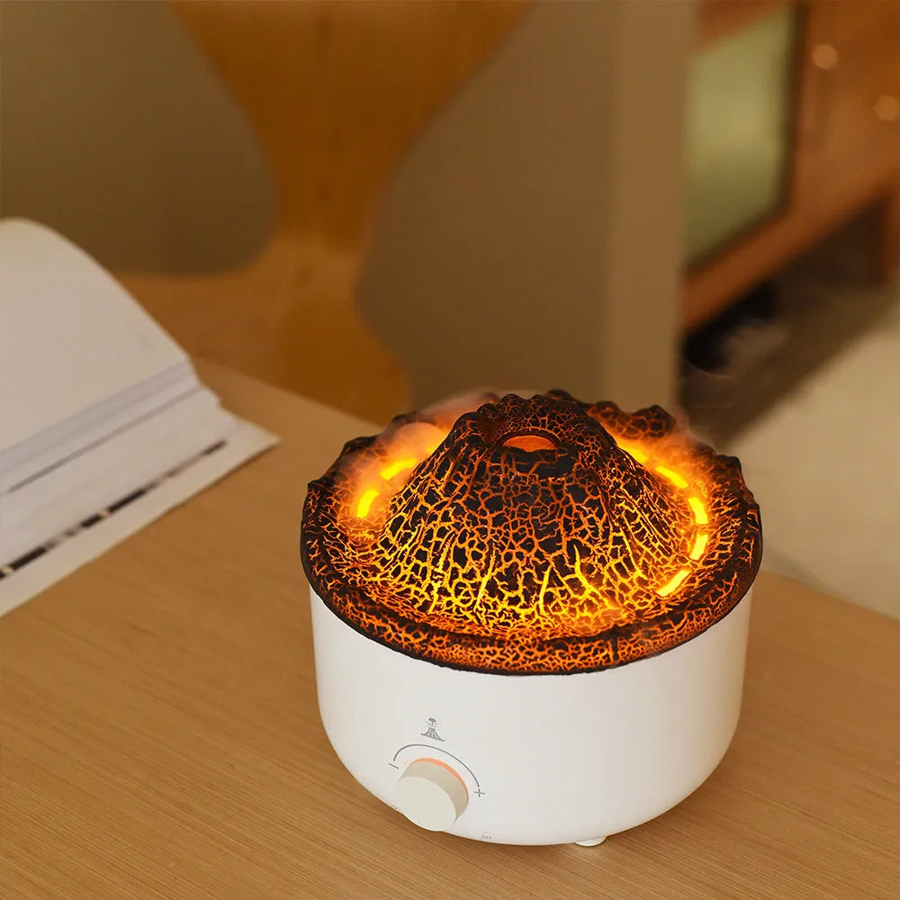 Small white volcano-shaped humidifier with simulated flame lighting and remote control