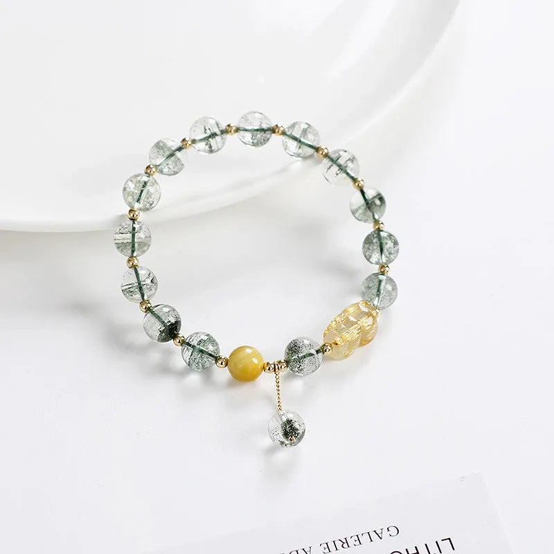 Green Phantom Quartz crystal bracelet with geometric beads and gold accents