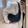 Retro dumpling-shaped women's shoulder bag in PU leather, shown in a choice of four colours.