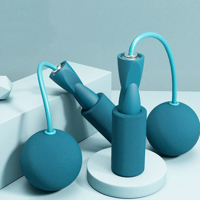 Weighted cordless jump rope with blue handles and PVC-coated steel rope for indoor fitness training