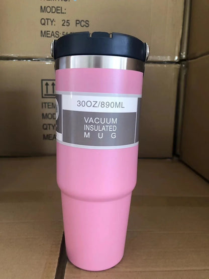 Insulated stainless steel travel tumbler with double-wall vacuum technology, sweat-proof powder coating, and BPA-free sliding lid for hot and cold drinks on the go.