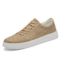 Men's white casual height increasing sneakers with hidden platform sole, low-top design, and lace-up closure